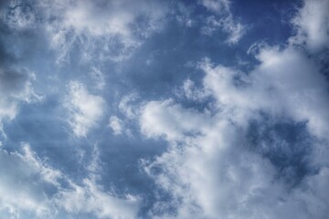 The blue sky is sprinkled with white clouds