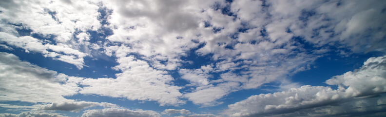 Blue sky cloud gradient background. Cloudy sky. Vivid cyan blue landscape in environment day horizon skyline view. White clouds on soft sky background. White cloudy sky.