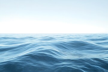 Fototapeta premium Calm blue ocean with gentle waves under a bright, clear sky. The smooth water surface creates a serene and tranquil atmosphere
