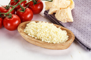Shredded Italian hard parmesan cheese