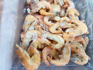 Frozen shrimp, close-up. Seafood in a store.