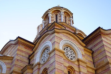 Obraz premium Corner turret on the facade of the Cathedral of Christ the Savior in Banja Luka, Bosnia and Herzegovina. A close-up photo of the main Orthodox church in Banja Luka, designed in the Byzantine style.