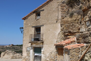 Ares del Maestre, a medieval village in the Province of Castellón, Spain, with a stone castle in ruins on a hilltop