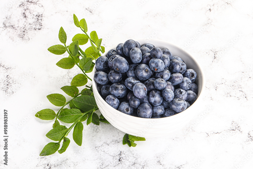 Wall mural ripe sweet blueberry in the bowl