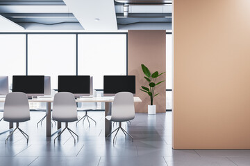 Modern bright coworking office interior with empty mock up place on wall, panoramic windows and city view, furniture and equipment. 3D Rendering.