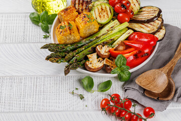 Assorted grilled vegetables on a plate, showcasing a colorful and healthy meal
