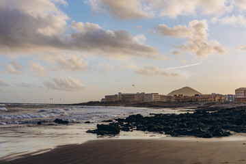 Sunrise light shining on ocean waves in Tenerife