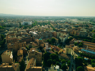 Italy- emilia-romagna- bologna- aerial view of residential district with street in centre