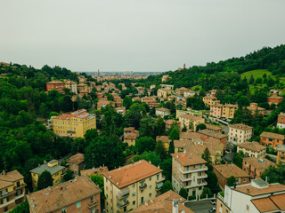 Obraz premium Italy- emilia-romagna- bologna- aerial view of residential district with street in centre