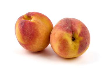 Fresh peaches, isolated on white background.