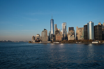 Naklejka premium Manhattan's beautiful skyline, New York, United States. Panorama view of New York city skyline in Midtown Manhattan. USA NYC. American big city. Lower Manhattan skyline at sunny day.