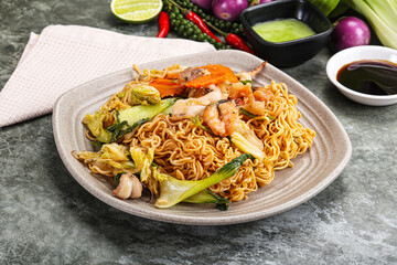 Asian cuisine - Fried noodles with seafood