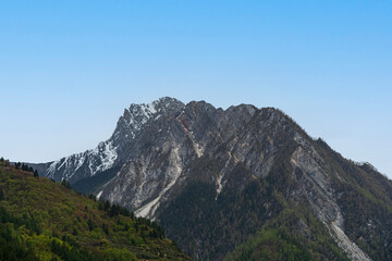 Snowy mountain peak in Jiuzhaigou National Park, China