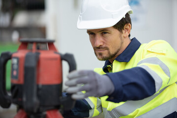 construction man worker measuring construction site