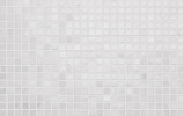 White tile wall background bathroom texture. Ceramic brick wall and floor tiles mosaic background in bathroom clean. Design pattern geometric with grid wallpaper decoration.