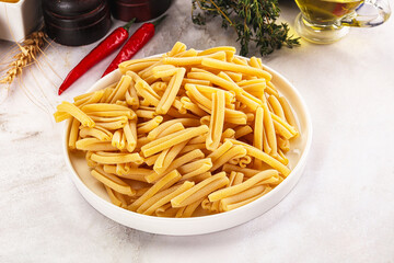 Raw dry Italian pasta - casarecce