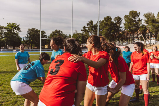 Rugby players team practicing on field