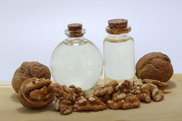 still life with a bottle walnuts oil and walnuts