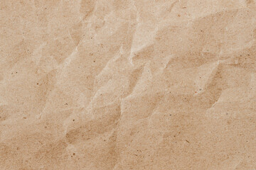 Close-up of wrinkled brown paper texture, natural imperfections, background design