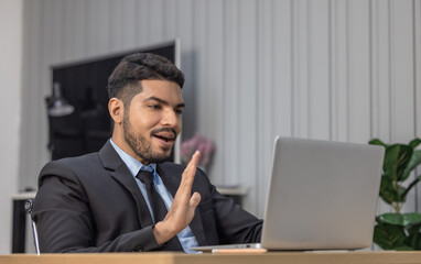 Focused Businessperson Working on Laptop