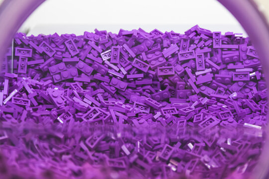Pile of LEGO bricks in purple colour displayed in the LEGO store Leicester Square in London