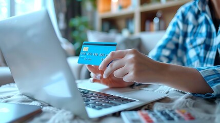 A close-up of a person making an online purchase on a laptop with a credit card, fingers typing on the keyboard, digital screen glowing, cozy indoor lighting, hd quality, natural look.