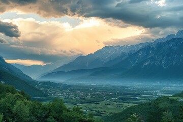Obraz premium A scenic view of a valley with mountains in the background, suitable for travel or outdoor adventure use