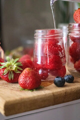 strawberry jam in a glass jar