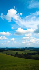 Peaceful Countryside Under Expansive Blue Sky with Serene White Clouds