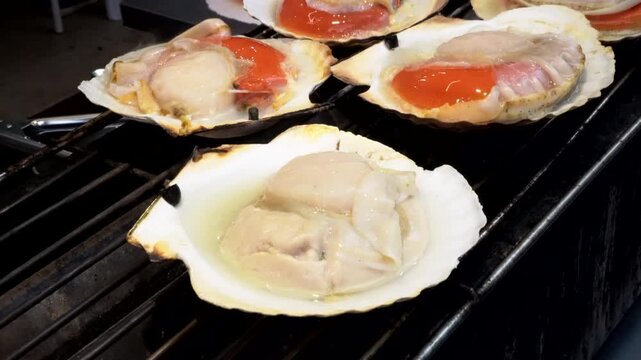 Charcoal grilling hotate Japanese large scallop Japan street food seafood 4k