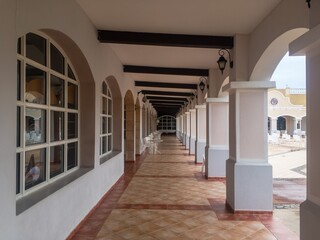 Archway in colonial Spanish style in holiday resort, generic hotel