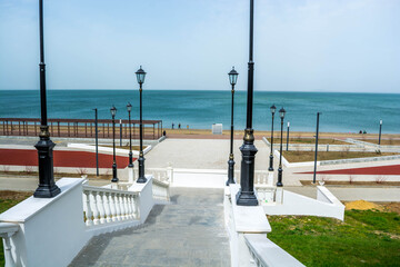 Obraz premium Embankment by the sea