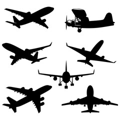 Set of black airplanes on a white background, vector illustration.