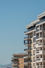 Fototapeta premium modern apartment building luxury exterior on a sunny day