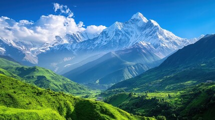 Fototapeta premium Majestic Mountain Peak with Snow-capped Summit and Lush Green Valley