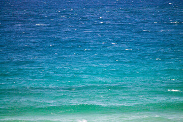 Gradient blue to green textured sea surface 