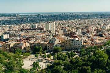 Fototapeta premium view of the city from the Bunkers del Carmel on a clear sky in Barcelona, Spain - may 2 2024