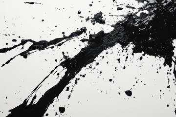 dramatic black ink splatters on pristine white surface intricate patterns of splashes and smudges creating abstract shapes with varying opacity and texture