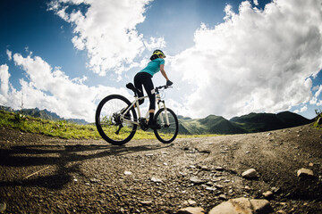 Riding mountain bike in the beautiful mountain top
