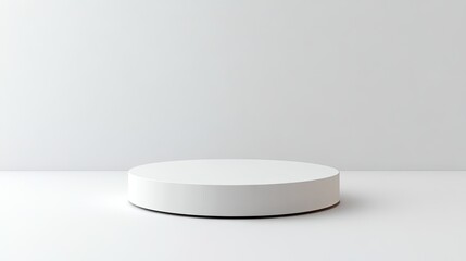 A simple round pedestal with a solid white background, perfect for clean and modern product presentations.