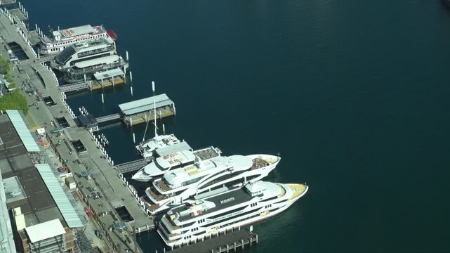 High angle view of large yachts in Darling harbour from a skyscraper in Barangaroo, Sydney Australia