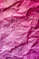 Naklejka premium Crumpled pink paper texture with varying shades and deep folds. Abstract vertical background
