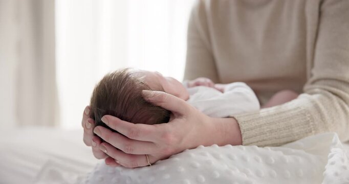 Newborn baby, mother and hands on hair with love to touch, mama connection and safety on bed. Motherhood, infant and trust bond with care in child growth, support and relax together in family home