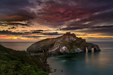 Sunset between the rock formations of San Juan de Gaztelugatxe, Bermeo, Bizkaia