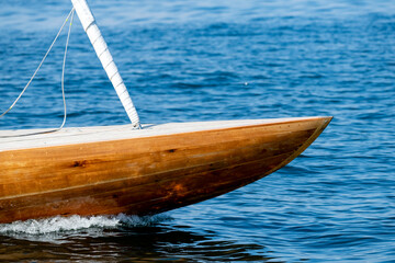 The bow of a sports yacht in the sea.