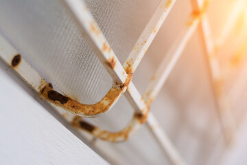 Rusty iron railing at home,Old iron gate with peeling paint texture and scratches