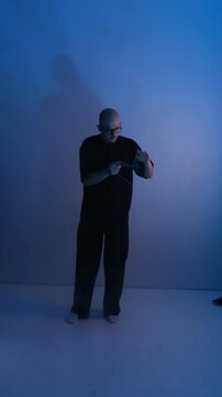 guy professionally spins yo yo, rope tricks, great background, light through fog
