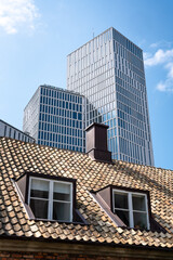 modern office building and old roof