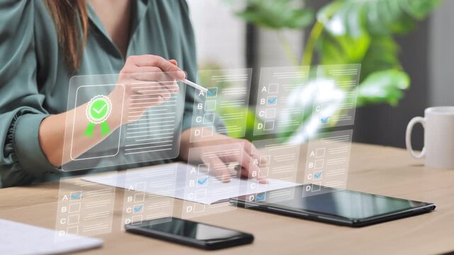 woman at home using tablet,filling out test questionnaire on internet,female at the desk passes test examination survey online on virtual screen,gets certification