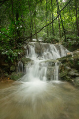 A picturesque waterfall in the rainforest of a tropical Sumatra island